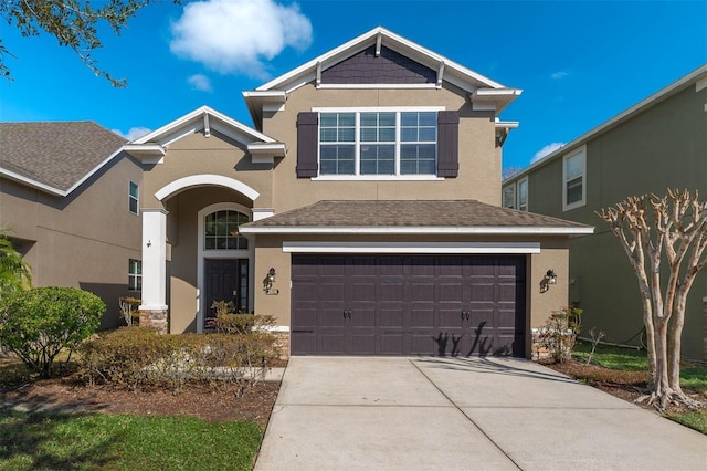 view of front of property with a garage