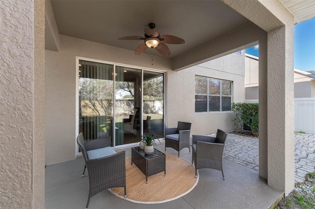 view of patio featuring ceiling fan