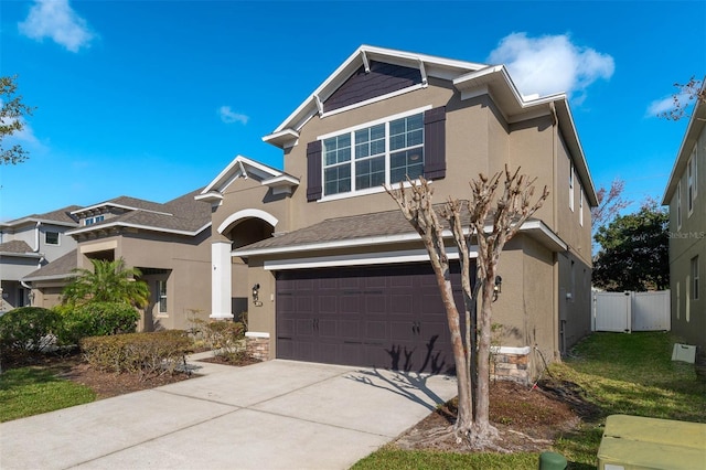 view of front of property featuring a garage