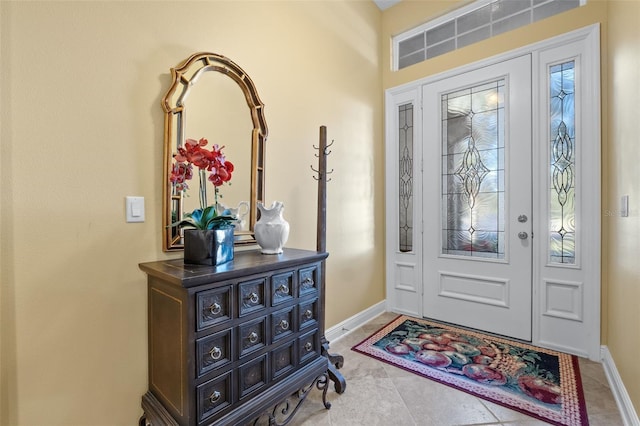 view of tiled foyer entrance