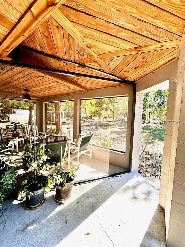 sunroom / solarium with wood ceiling