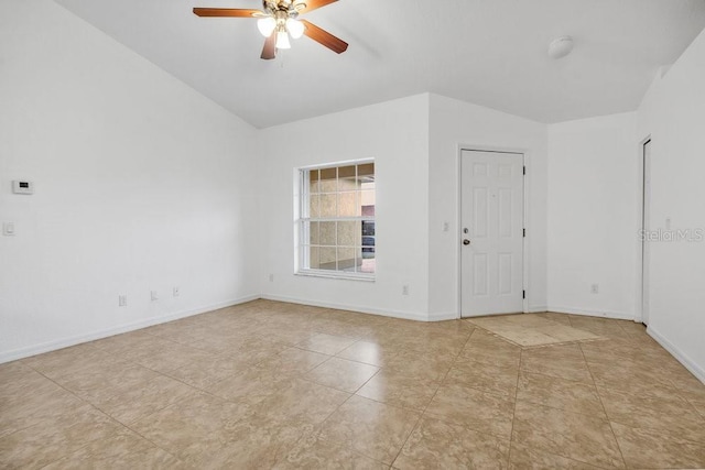 unfurnished room featuring ceiling fan and vaulted ceiling