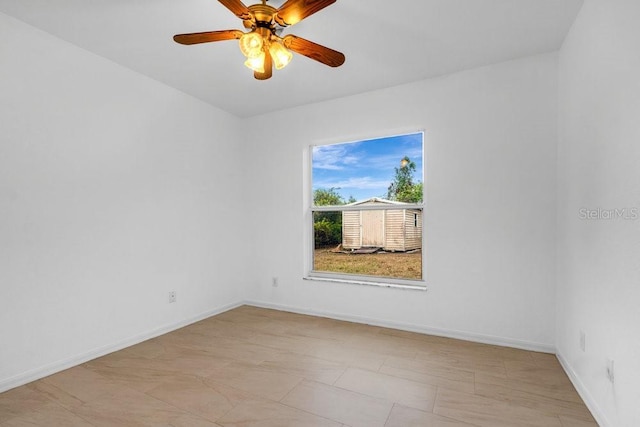 empty room featuring ceiling fan