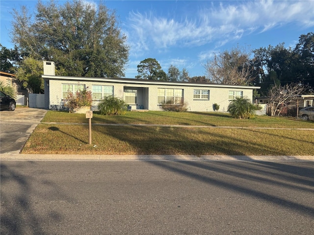 view of front of home with a front lawn