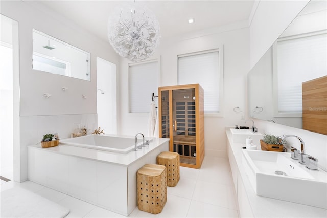 bathroom with a relaxing tiled tub, tile patterned floors, ornamental molding, and vanity