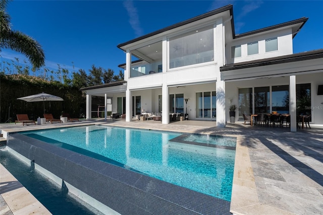 rear view of house with a patio area