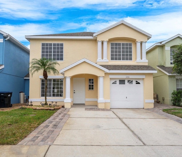 view of front of property featuring a garage