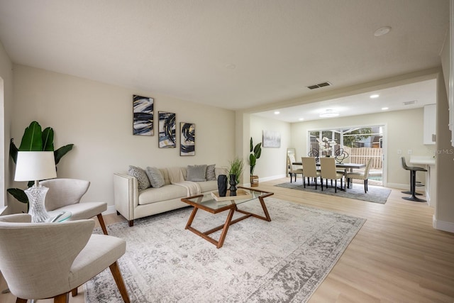 living room featuring light wood-type flooring