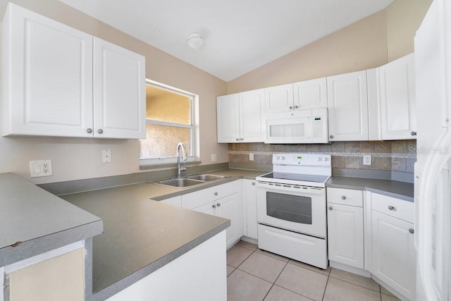 kitchen with white cabinets and white appliances