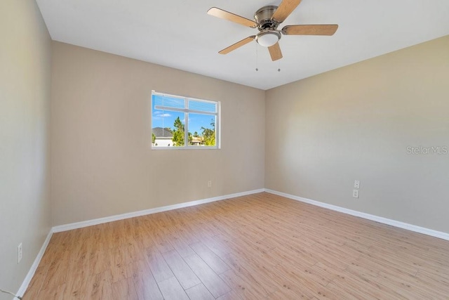 unfurnished room featuring ceiling fan and light hardwood / wood-style floors