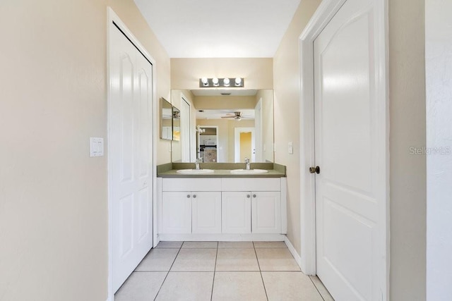 bathroom with ceiling fan, vanity, and tile patterned floors