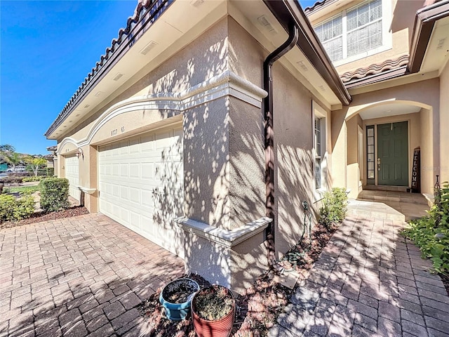 exterior space with a garage