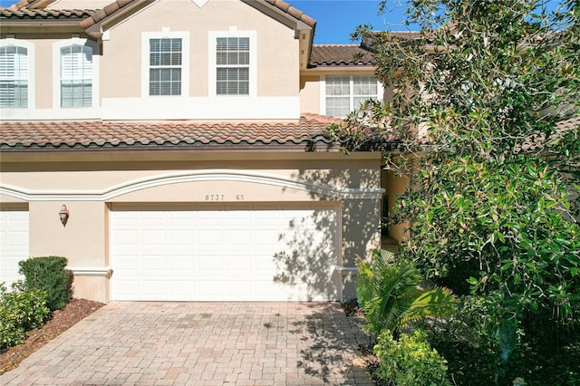 view of front of home featuring a garage