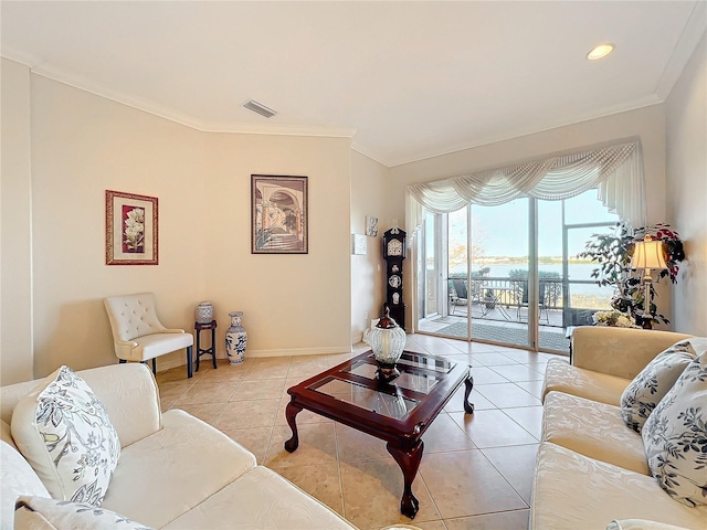 living room with light tile patterned floors and ornamental molding