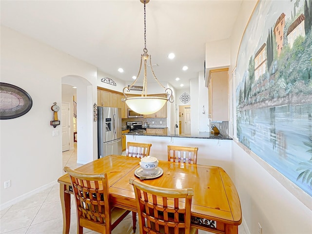 dining room featuring light tile patterned floors