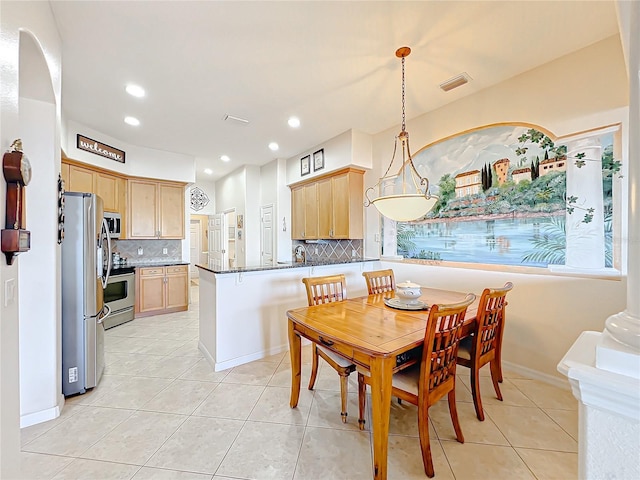 view of tiled dining room