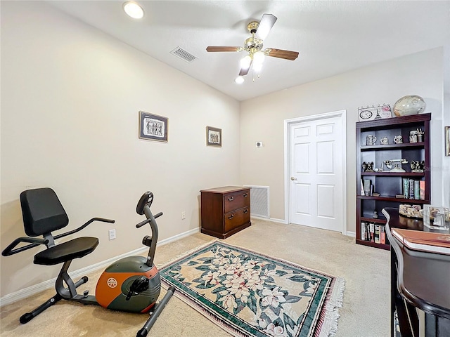 office with light carpet and ceiling fan