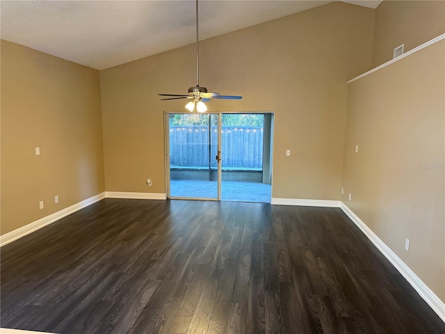 unfurnished room with ceiling fan, high vaulted ceiling, and dark wood-type flooring