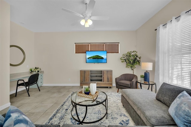 living room featuring ceiling fan and light tile patterned flooring