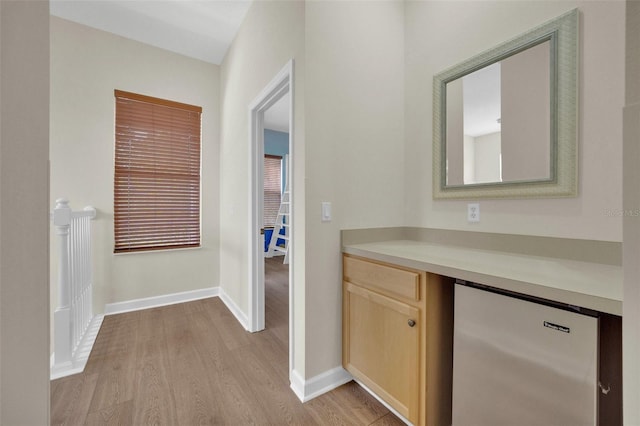 corridor featuring light hardwood / wood-style flooring