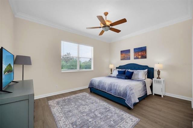 bedroom with ceiling fan, dark wood-type flooring, and ornamental molding