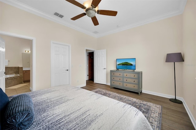 bedroom with dark hardwood / wood-style flooring, ensuite bath, ceiling fan, and crown molding