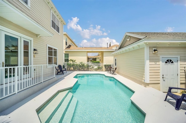 view of pool featuring a patio area