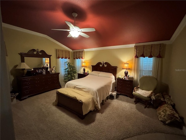 carpeted bedroom featuring ceiling fan, crown molding, and lofted ceiling