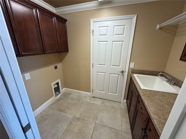 clothes washing area featuring light tile patterned floors, a sink, baseboards, cabinet space, and electric dryer hookup