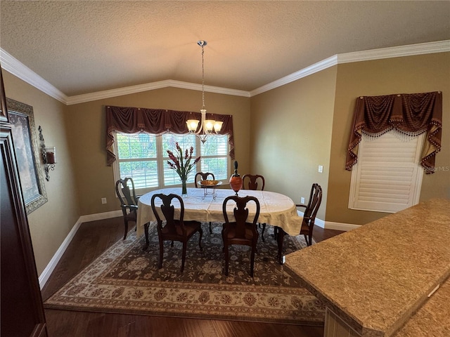 dining space featuring baseboards, a chandelier, vaulted ceiling, and dark wood finished floors