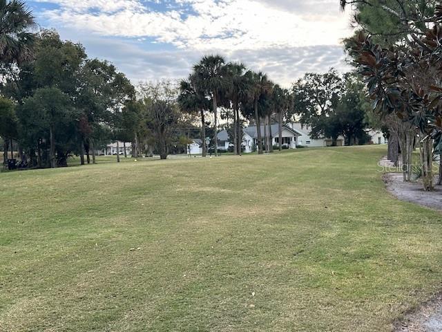 view of community with a lawn