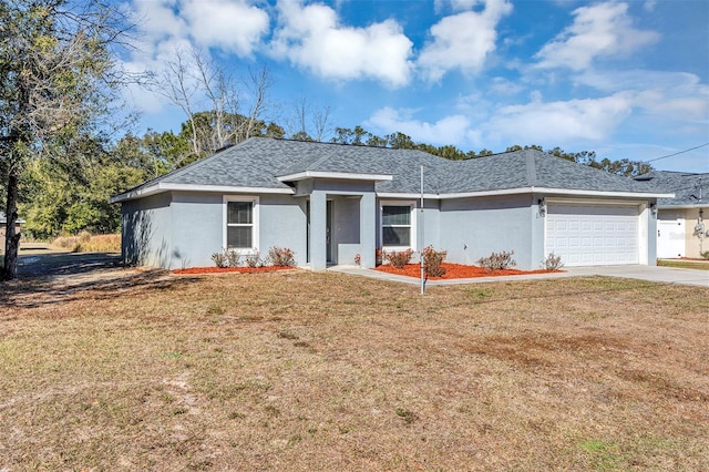 ranch-style house with a front lawn and a garage