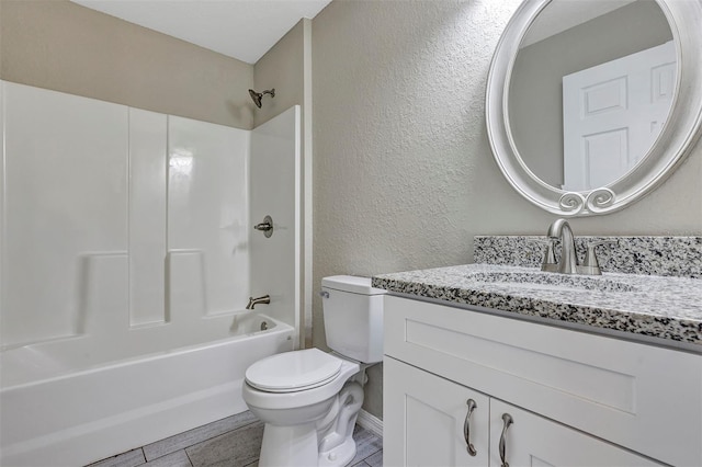 full bathroom with toilet, vanity, and shower / bath combination