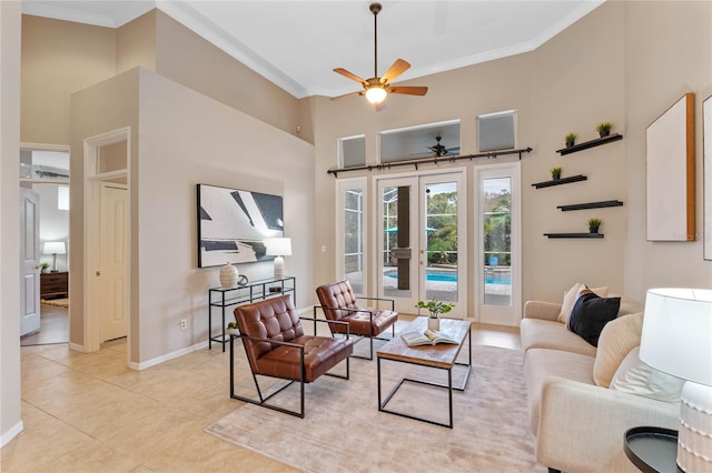 living room featuring light tile patterned flooring, ornamental molding, ceiling fan, and french doors