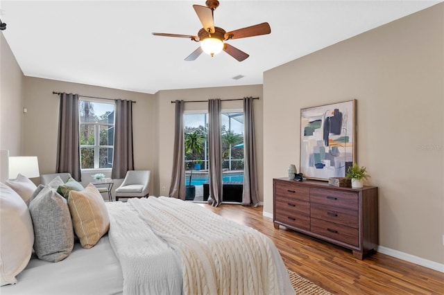 bedroom featuring ceiling fan, access to exterior, and light hardwood / wood-style floors