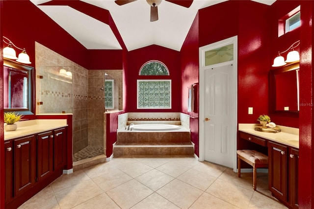 bathroom with vanity, tile patterned floors, lofted ceiling, and plus walk in shower