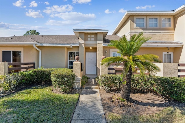 view of front of home with a front lawn