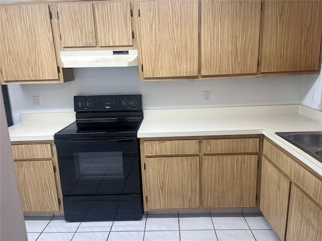 kitchen with light countertops, electric range, and under cabinet range hood