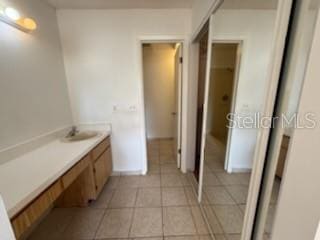 bathroom featuring a sink and tile patterned floors