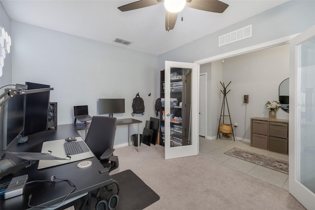 home office with light tile patterned flooring, french doors, and ceiling fan