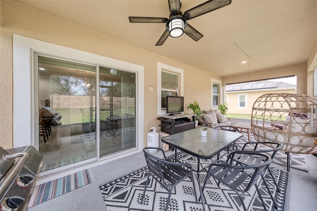 view of patio / terrace featuring ceiling fan