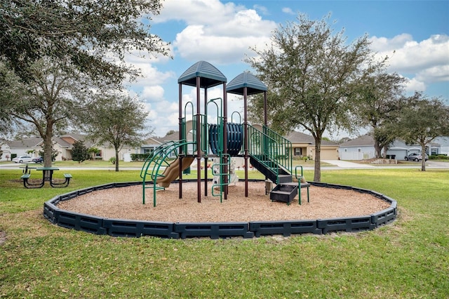 view of jungle gym with a lawn