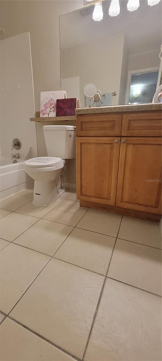 full bathroom featuring shower / tub combination, tile patterned floors, vanity, and toilet