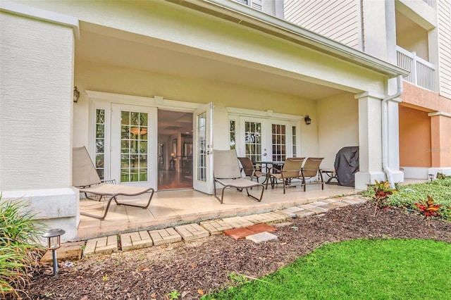 view of patio featuring french doors