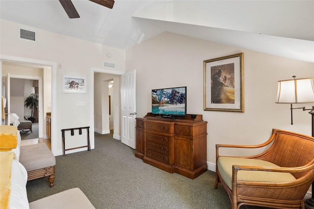 sitting room featuring ceiling fan, carpet floors, and vaulted ceiling