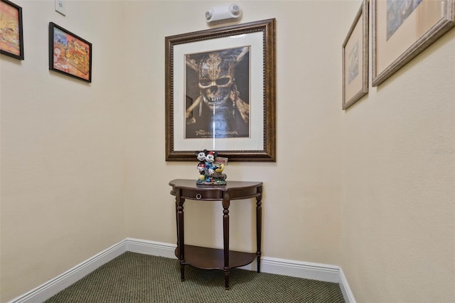 hallway with carpet flooring