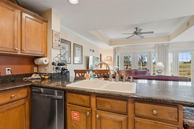 kitchen featuring dishwasher, sink, a raised ceiling, crown molding, and french doors