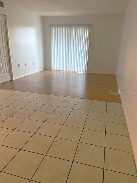 view of tiled spare room