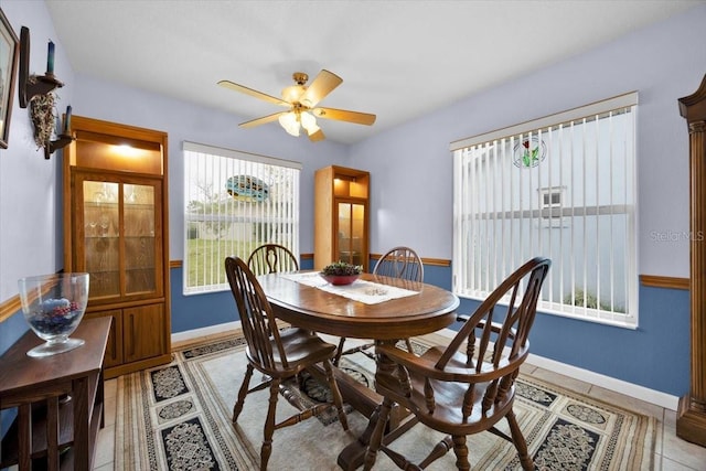 dining space featuring ceiling fan and a wealth of natural light