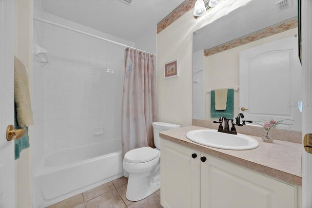 full bathroom with toilet, tile patterned flooring, shower / bath combo with shower curtain, and vanity